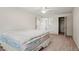 Bedroom with ceiling fan and window at 6196 S Rosewood Dr, Littleton, CO 80121