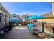 Spacious stone backyard patio with outdoor seating, perfect for enjoying sunny days and warm evenings with friends and Gathering at 2321 Alton St, Denver, CO 80238