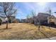 Expansive community park with mature trees and well-maintained grassy areas, ideal for recreation and neighborhood gatherings at 2321 Alton St, Denver, CO 80238