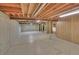 Unfinished basement boasts high ceilings and open layout at 6417 S Florence Way, Englewood, CO 80111