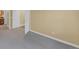 Bedroom with neutral walls and grey carpet and a closet with white doors at 6417 S Florence Way, Englewood, CO 80111