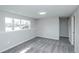 Bright bedroom with neutral walls and carpet, featuring a double door closet at 710 S Oakland St, Aurora, CO 80012