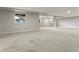 Finished basement featuring neutral walls and plush carpeting offering an adaptable living space at 965 Peach Leaf Ln, Elizabeth, CO 80107