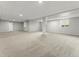 Spacious finished basement with plush carpeting, neutral walls, and bright recessed lighting at 965 Peach Leaf Ln, Elizabeth, CO 80107