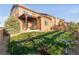 Fenced backyard with lush green lawn and a patio perfect for outdoor entertaining and relaxation at 3231 Riverwood Way, Castle Rock, CO 80109