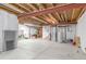 Large unfinished basement showcasing exposed beams and utilities, offering a blank canvas for future expansion at 3231 Riverwood Way, Castle Rock, CO 80109