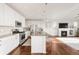 Modern kitchen with stainless steel appliances, granite countertops, and a cozy breakfast bar for casual dining at 3231 Riverwood Way, Castle Rock, CO 80109