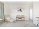 Bright loft area with neutral walls and carpet, window with natural light, and neutral decor, offering a versatile space at 3231 Riverwood Way, Castle Rock, CO 80109