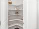 Spacious walk-in pantry with ample shelving for organized storage and easy access at 3231 Riverwood Way, Castle Rock, CO 80109