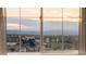 Window view overlooking community park, playground, and mountain views at 3231 Riverwood Way, Castle Rock, CO 80109