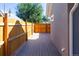 Back porch overlooking newly stained wooden fence at 665 S Meade St, Denver, CO 80219