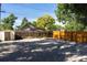 Large backyard space with gravel and a storage shed at 665 S Meade St, Denver, CO 80219