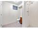 Functional bathroom area featuring a shower, toilet, and vanity, blending convenience with utility at 10330 Melody Dr, Northglenn, CO 80260