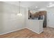 Dining area with hardwood floors and a kitchen view at 4005 S Dillon Way # 102, Aurora, CO 80014