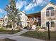 Two-story townhome with balcony and stone accents at 4005 S Dillon Way # 102, Aurora, CO 80014