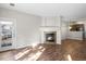 Living room features a fireplace and hardwood floors at 4005 S Dillon Way # 102, Aurora, CO 80014