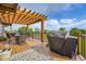 Spacious deck area with pergola, barbecue grill, and outdoor dining set; perfect for entertaining at 3191 W 151St Ct, Broomfield, CO 80023