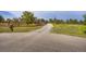 Driveway view of a home with a long driveway and fenced-in yard at 3191 W 151St Ct, Broomfield, CO 80023