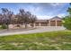 Spacious three-car garage, complemented by a large driveway and mature landscaping at 3191 W 151St Ct, Broomfield, CO 80023