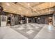 Large garage with updated floors, and custom storage for cars, tools, and workout equipment at 3191 W 151St Ct, Broomfield, CO 80023