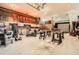 Large garage area features ample lighting, work benches, storage, and cool Firestone sign at 3191 W 151St Ct, Broomfield, CO 80023