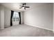 Spacious bedroom with large window and neutral carpeting at 185 Ambrose St, Erie, CO 80516
