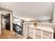 Second story hallway, with carpet flooring, features convenient storage, connecting living areas at 8930 Apache Plume Dr, Parker, CO 80134