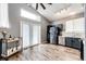 Open-concept kitchen featuring stainless steel appliances and hardwood floors at 8930 Apache Plume Dr, Parker, CO 80134