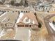 Gorgeous home featuring a tile roof, well-maintained landscaping, and a three-car garage at 49 Willowcroft Dr, Littleton, CO 80123