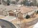 Stunning home with a tile roof, three-car garage, and beautiful landscaping in a desirable neighborhood at 49 Willowcroft Dr, Littleton, CO 80123