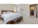 Comfortable bedroom with a view to the closet, shuttered windows, and a warm atmosphere at 49 Willowcroft Dr, Littleton, CO 80123