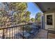 Balcony overlooking trees and parking. Relax and enjoy your outdoor space at 7205 S Gaylord St # F15, Littleton, CO 80122