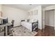 Bedroom features a desk and comfortable bed. Natural light brightens the space at 7205 S Gaylord St # F15, Littleton, CO 80122