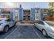 Inviting exterior view of a multi-Gathering home featuring parking spaces in front of the building at 7205 S Gaylord St # F15, Littleton, CO 80122