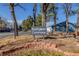 Well-manicured entrance with Southglenn Commons signage at 7205 S Gaylord St # F15, Littleton, CO 80122