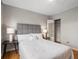 Bedroom with hardwood floors and walk-in closet at 1130 N N Pennsylvania St # 306, Denver, CO 80203