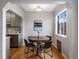 Charming dining area with hardwood floors, modern cabinets, and natural light at 1130 N N Pennsylvania St # 306, Denver, CO 80203