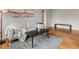 Spacious living room with hardwood floors, modern furniture, and stylish decor at 1130 N N Pennsylvania St # 306, Denver, CO 80203