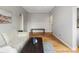 Bright living room with hardwood floors, modern furniture, and an open layout at 1130 N N Pennsylvania St # 306, Denver, CO 80203