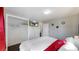 Bedroom showcasing a queen bed, mirrors, and closet at 7248 S Broadway, Centennial, CO 80122