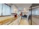 Bright kitchen with stainless steel appliances and an open view to the dining room at 7248 S Broadway, Centennial, CO 80122