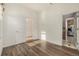 Bright hallway with doors to other rooms and kitchen at 1944 W 33Rd Ave, Denver, CO 80211