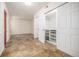 Hallway with tile floors and built-in storage at 1944 W 33Rd Ave, Denver, CO 80211