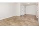 Living area with tile floors and access to other rooms at 1944 W 33Rd Ave, Denver, CO 80211