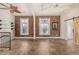 Spacious living area with exposed brick and tiled floors at 1944 W 33Rd Ave, Denver, CO 80211