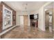 Living room with fireplace, tiled floors, and barn door at 1944 W 33Rd Ave, Denver, CO 80211