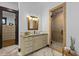 Bathroom featuring marble floors, granite counters, a walk-in shower, and custom cabinets at 11790 Huckleberry Drive Dr, Franktown, CO 80116
