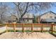 Wooden back deck offering a tranquil space for outdoor relaxation and entertaining with views of the neighborhood at 10262 W Ida Ave # 243, Littleton, CO 80127