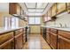Efficient kitchen design featuring plenty of cabinetry and modern appliances at 10262 W Ida Ave # 243, Littleton, CO 80127