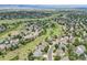 High angle view featuring a sprawling neighborhood with mountains in the background at 9385 Prairie View Dr, Highlands Ranch, CO 80126